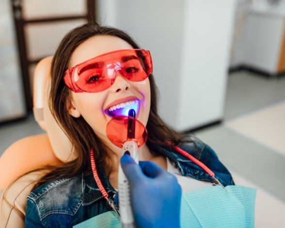 Woman receiving cosmetic dental bonding