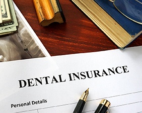dental insurance form on table
