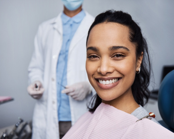 Closeup of patient smiling in treatment chair
