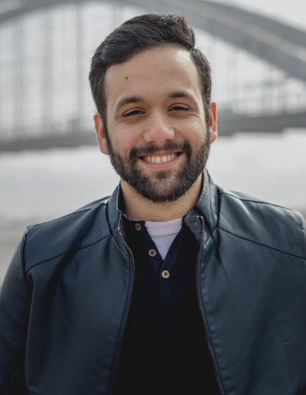 Man smiling after periodontal therapy