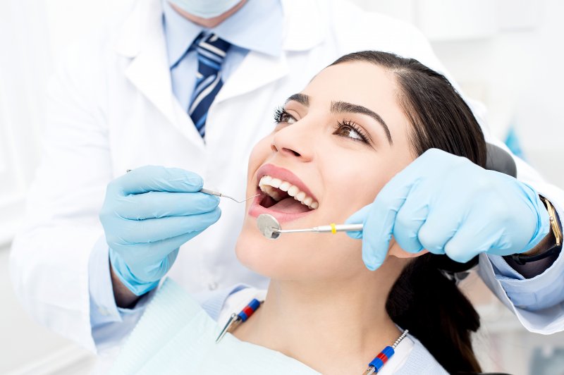 woman smiling during dental checkup